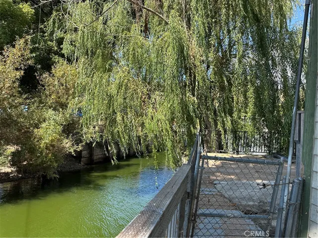 a view of a wooden floor and a yard