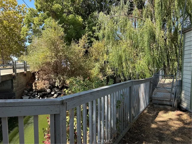 a view of a wooden fence
