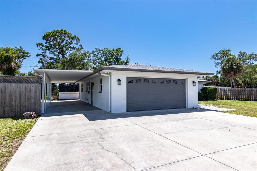 3338 Roslyn Road Venice, FL 34293 - Photo 2 of 31 Large 2-3 car deep carport