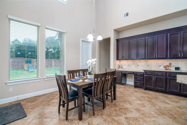 a view of a dining room with furniture