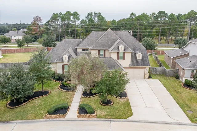 an aerial view of a house with garden