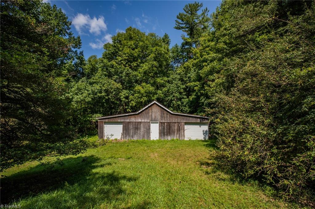 4970-4972 Big Ivy Road Purlear, NC 28665 - Photo 3 of 21 Garage/Workshop plenty of flat usable land!