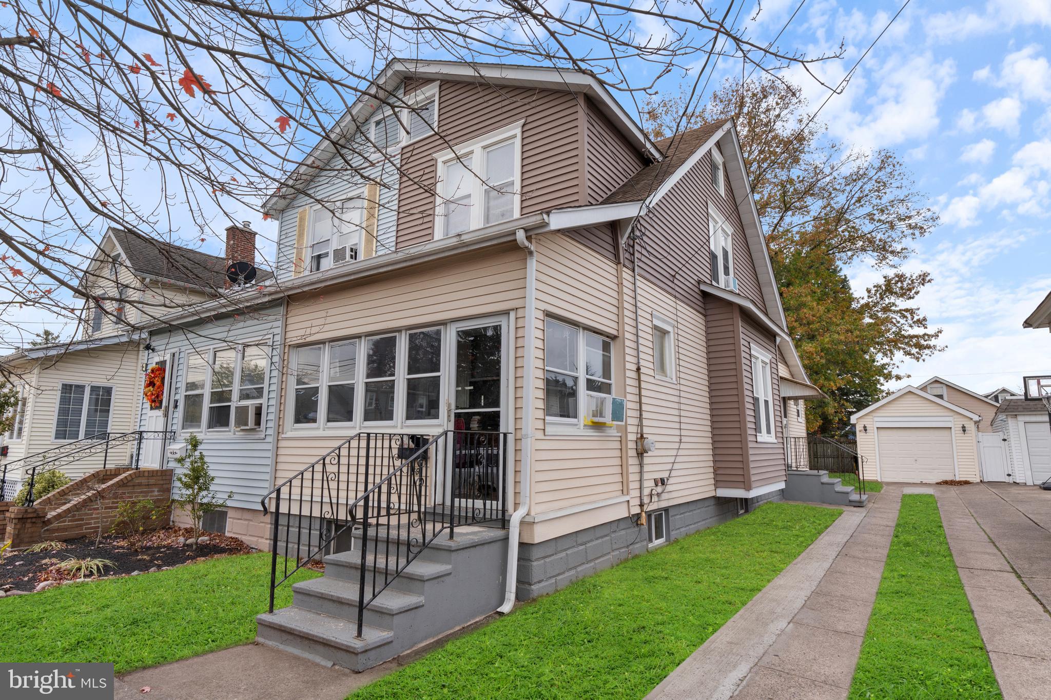 69 Reed Avenue Hamilton, NJ 08610 - Photo 2 of 17 a view of a house with a yard