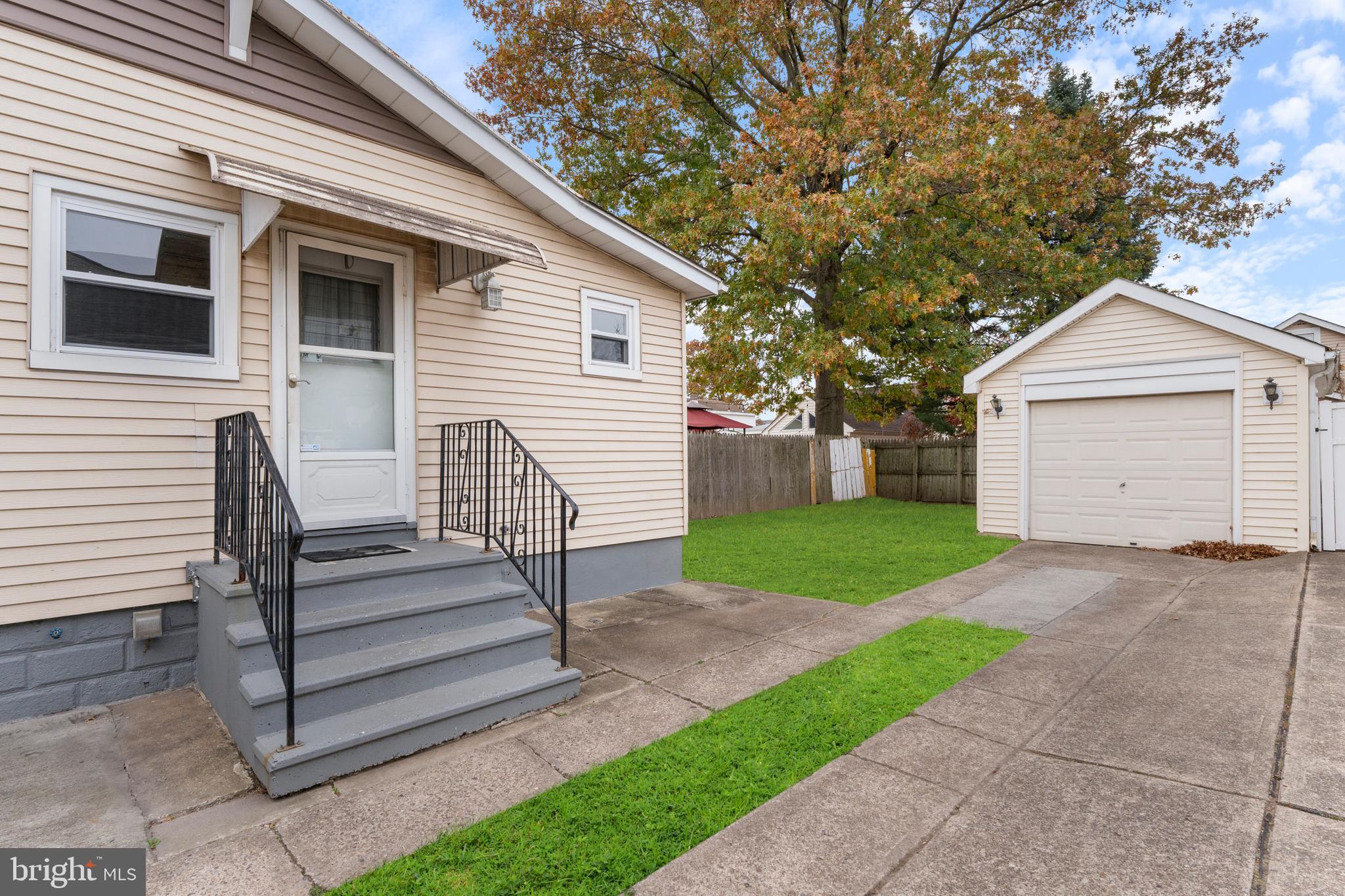 69 Reed Avenue Hamilton, NJ 08610 - Photo 3 of 17 a view of a house with a yard