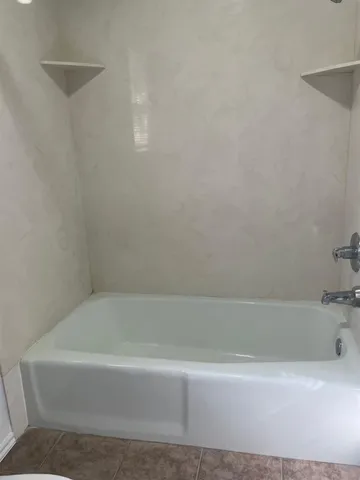 a bathroom with a bathtub