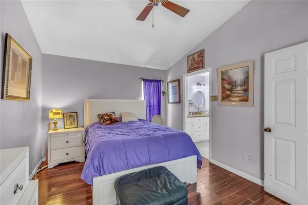 a bed room with a bed and a window