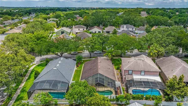 an aerial view of a house with a garden