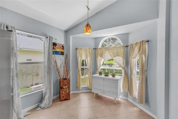 a view of an entryway with a chandelier