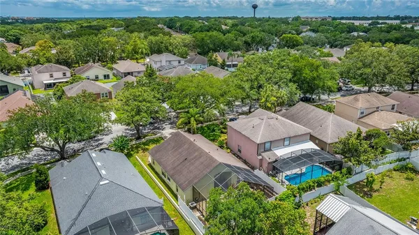 an aerial view of a house with a garden