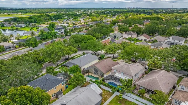 an aerial view of residential house with outdoor space and street view