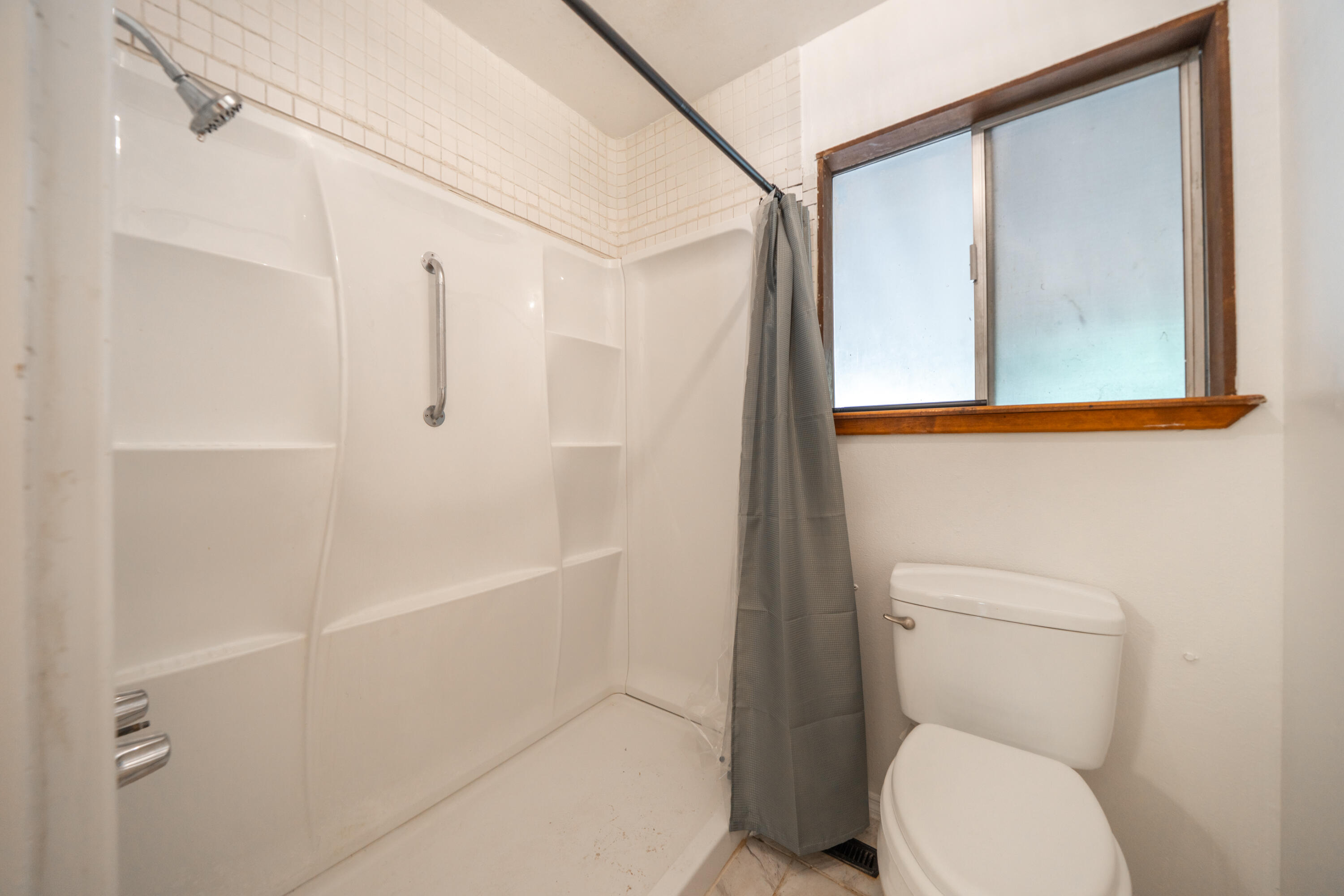 37347 Cypress Avenue Burney, CA 96013 - Photo 29 of 62 a bathroom with a toilet and a shower
