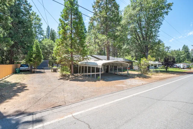 a house with trees in the background
