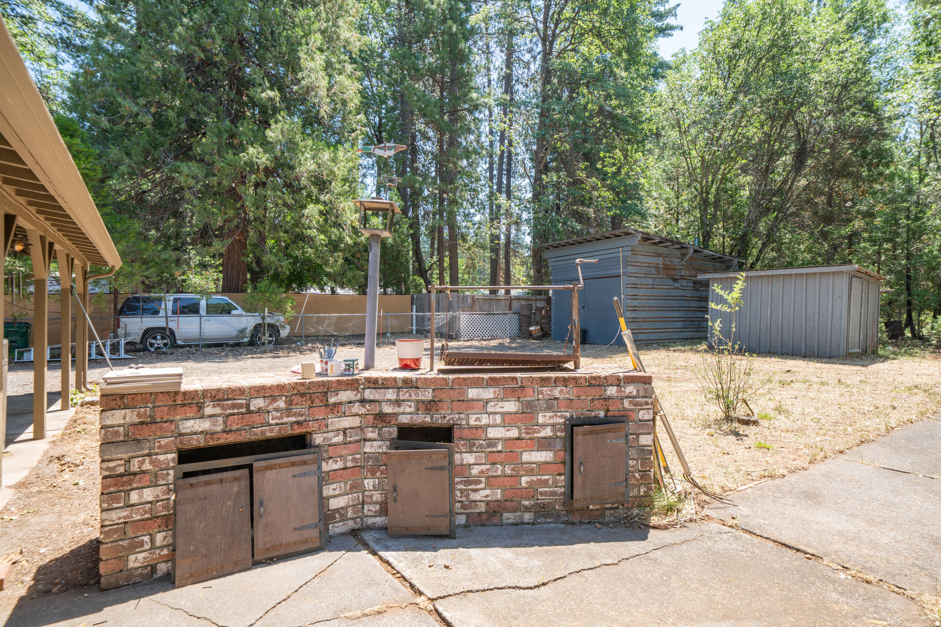 37347 Cypress Avenue Burney, CA 96013 - Photo 37 of 62 a view of a backyard with sitting area