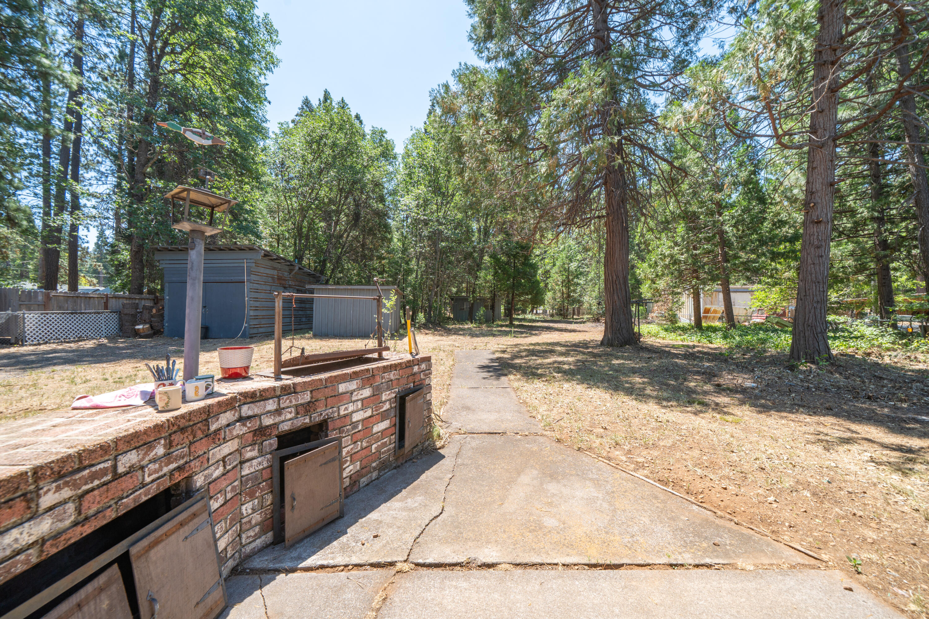 37347 Cypress Avenue Burney, CA 96013 - Photo 38 of 62 a view of a backyard with seating space
