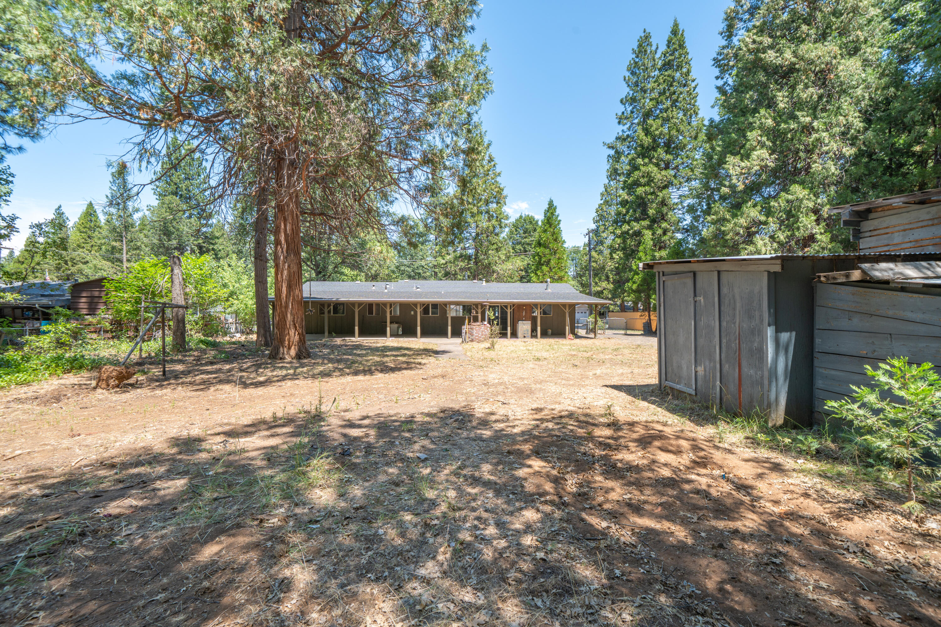 37347 Cypress Avenue Burney, CA 96013 - Photo 48 of 62 a front view of a house with a yard
