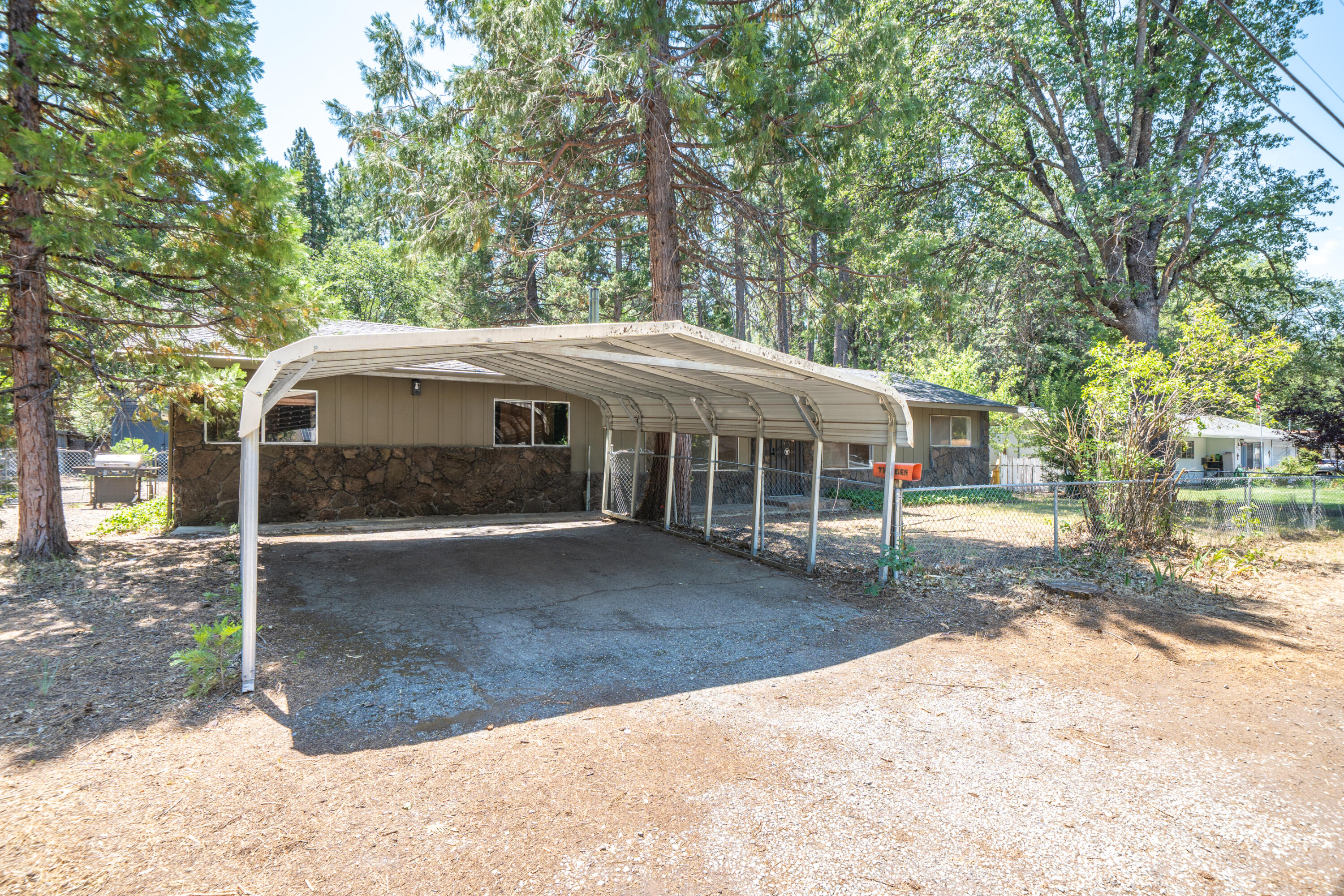 37347 Cypress Avenue Burney, CA 96013 - Photo 6 of 62 a view of a house with a yard