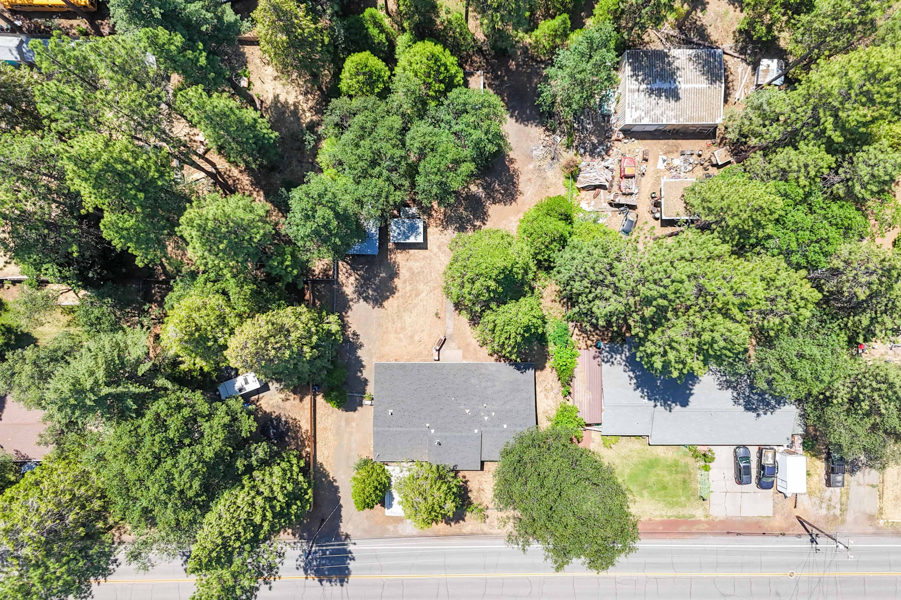 37347 Cypress Avenue Burney, CA 96013 - Photo 62 of 62 an aerial view of a house with a yard and garden