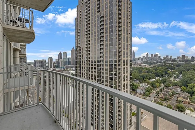 a view of a balcony with city view