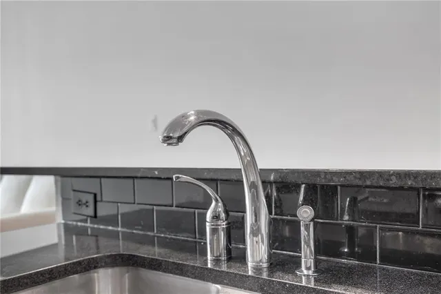 a kitchen with a washer and dryer