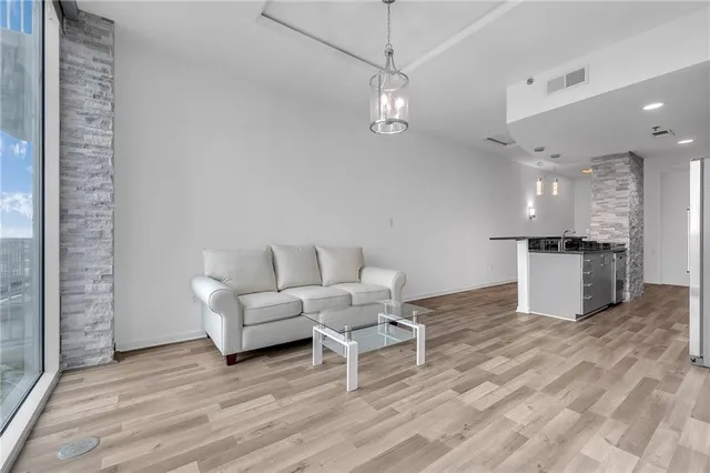 a bathroom with a sink toilet and a mirror