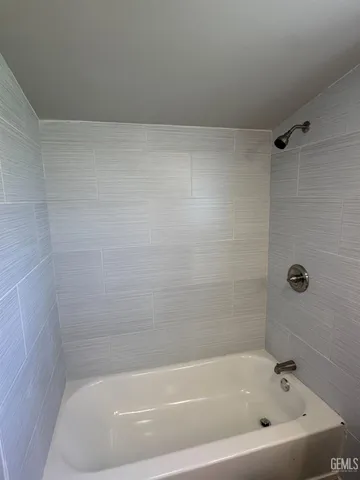 a close up of a bathtub in a bathroom