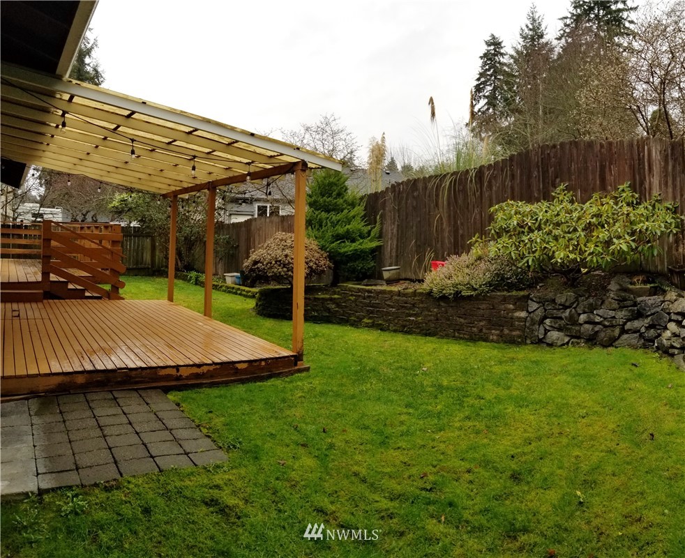 36308 25th Place South Federal Way, WA 98003 - Photo 24 of 27 a view of a backyard with plants and patio