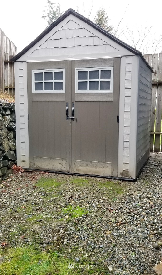 36308 25th Place South Federal Way, WA 98003 - Photo 25 of 27 a view of a backyard of the house