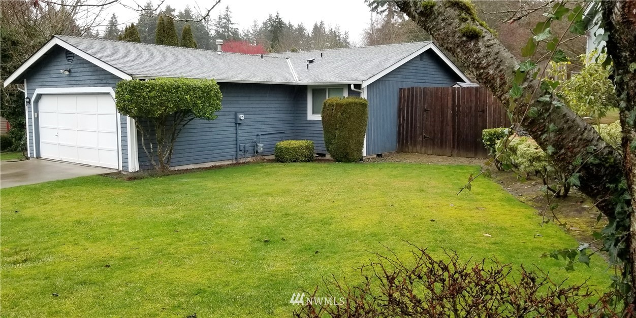 36308 25th Place South Federal Way, WA 98003 - Photo 26 of 27 a view of a backyard of the house