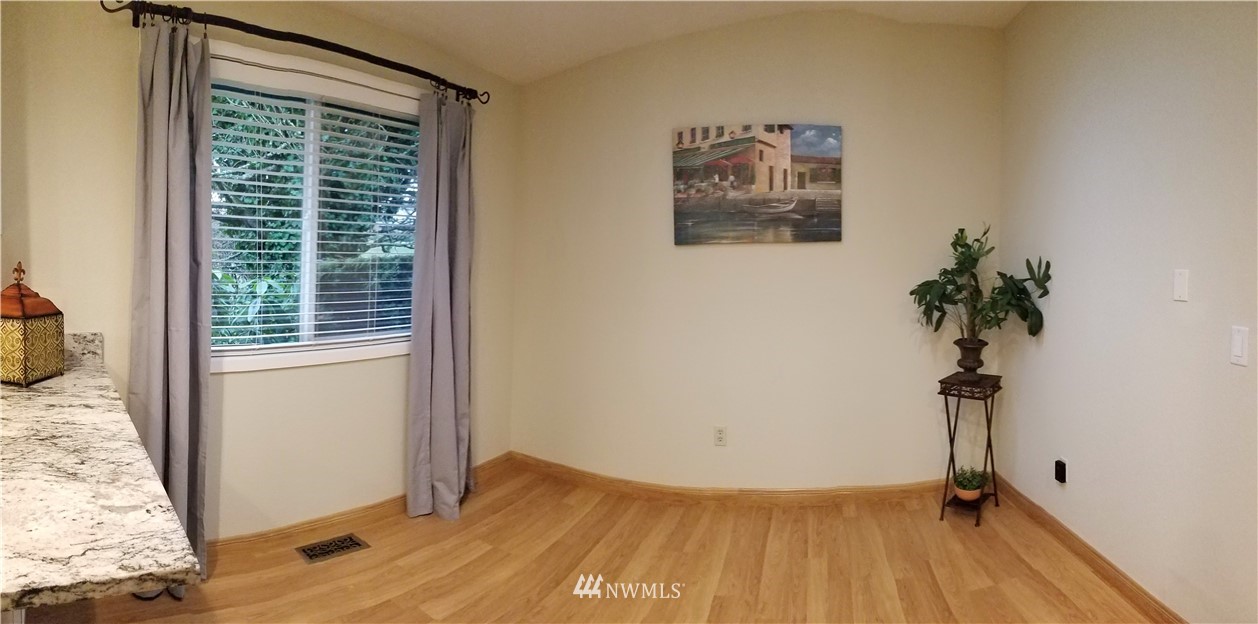 36308 25th Place South Federal Way, WA 98003 - Photo 4 of 27 a view of a room with wooden floor and a window