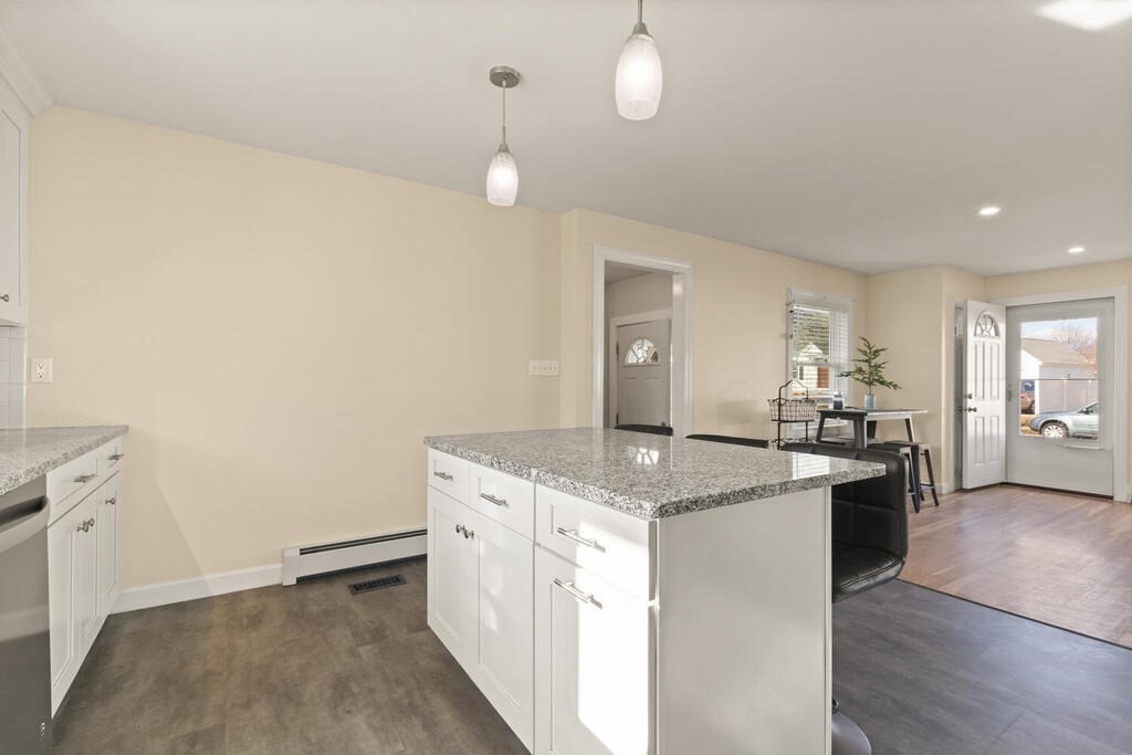 122 Gilman Street Nashua, NH 03060 - Photo 20 of 31 a kitchen with a sink and cabinets