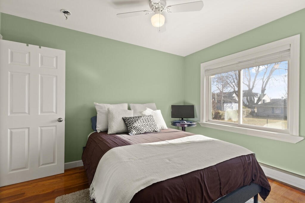 122 Gilman Street Nashua, NH 03060 - Photo 25 of 31 a bedroom with a large bed and a window