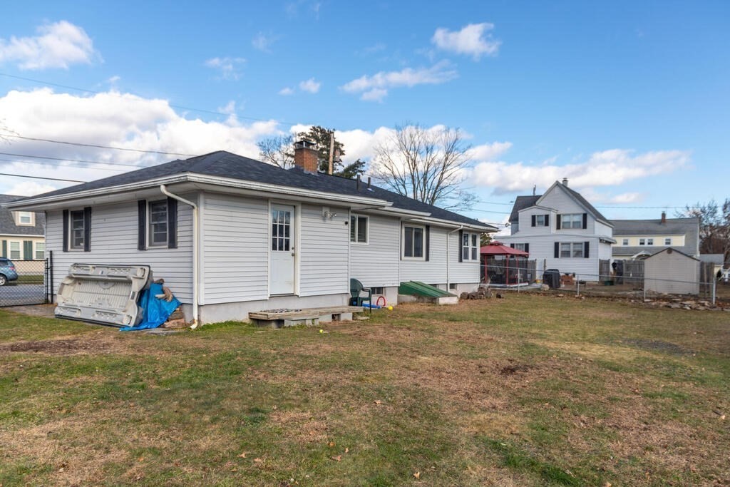 122 Gilman Street Nashua, NH 03060 - Photo 28 of 31 a view of a house with a patio