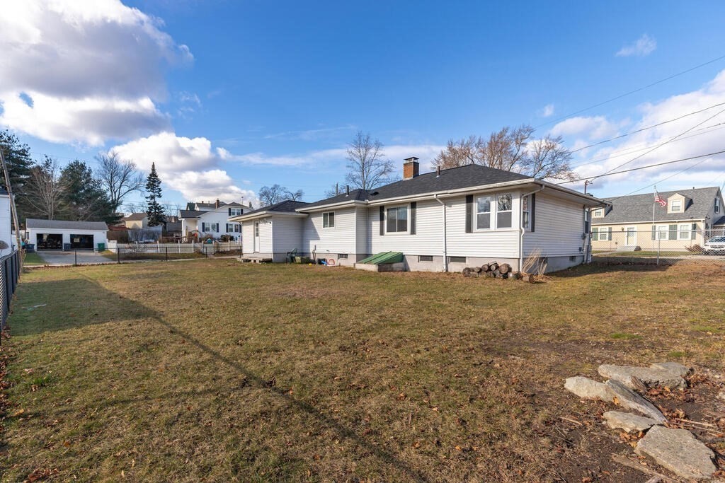 122 Gilman Street Nashua, NH 03060 - Photo 31 of 31 a view of a house with a yard