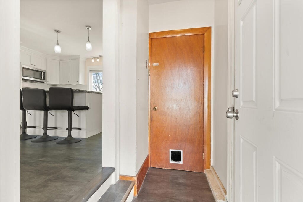 122 Gilman Street Nashua, NH 03060 - Photo 5 of 31 a view of a hallway with front door