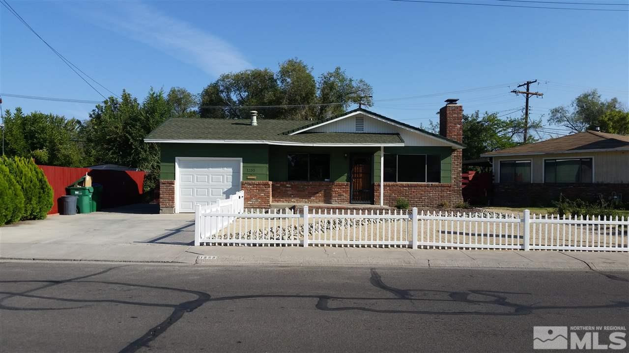 1255 Roberts Street Reno, NV 89502 - Photo 1 of 1 a view of a house with a small yard and plants