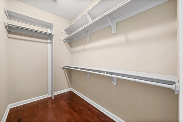 a view of an empty walk in closet