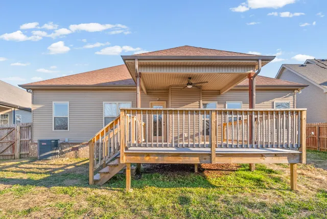 a view of swimming pool with a backyard