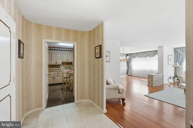 a bedroom with a bed and a view of bathroom