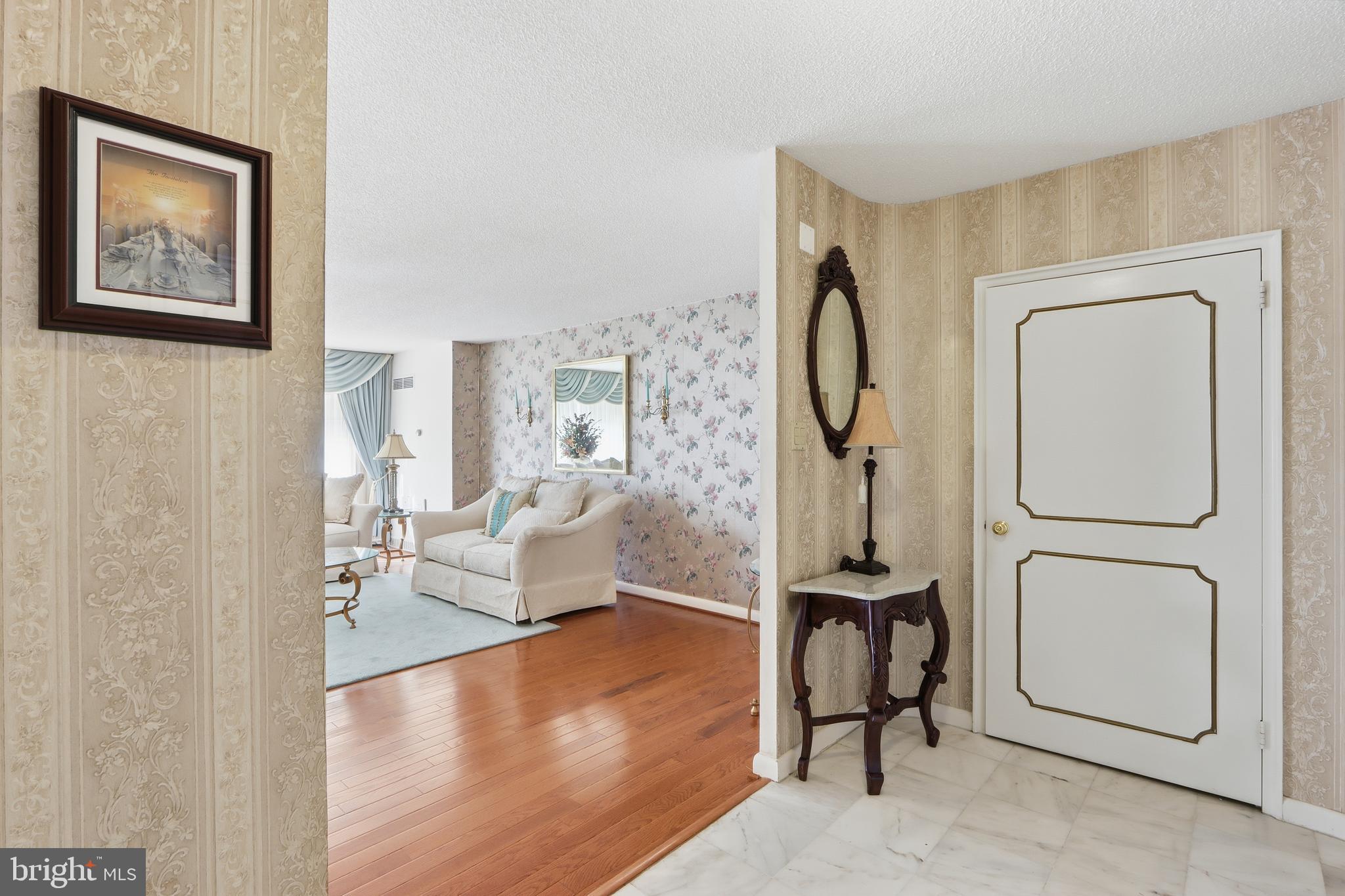 7111 Park Heights Avenue, Unit 104 Baltimore, MD 21215 - Photo 14 of 39 a view of a room with gym equipment and a large window