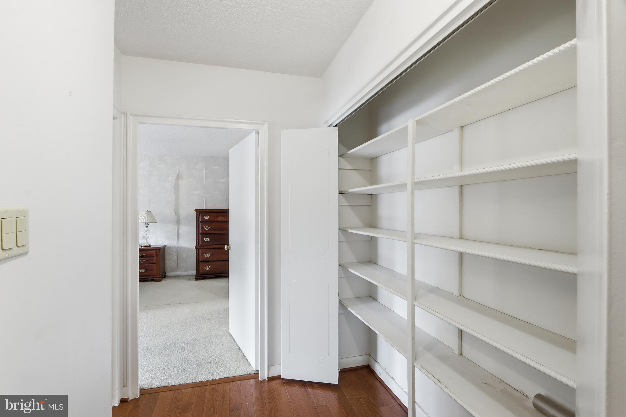 7111 Park Heights Avenue, Unit 104 Baltimore, MD 21215 - Photo 27 of 39 a view of a walk in closet