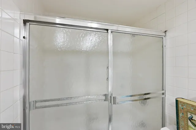 a bathroom with a glass shower