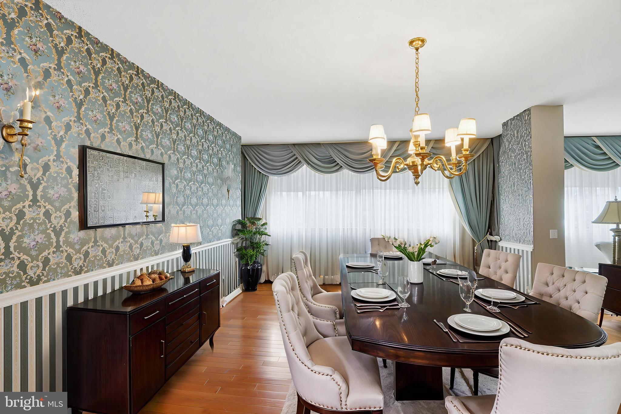 7111 Park Heights Avenue, Unit 104 Baltimore, MD 21215 - Photo 37 of 39 a living room with furniture and a wooden floor