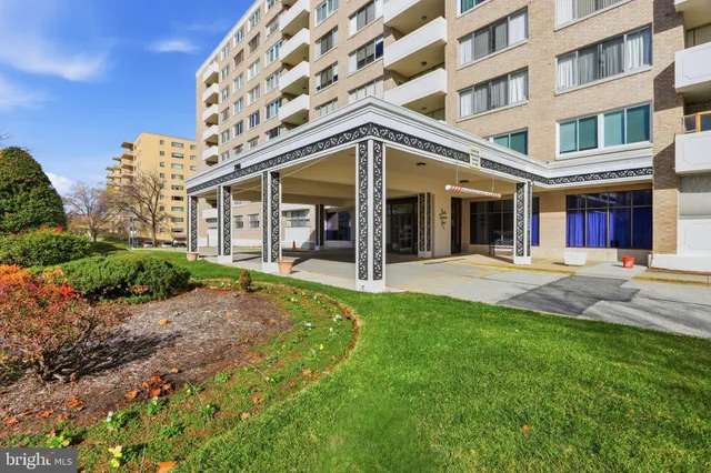 a view of a building with a swimming pool