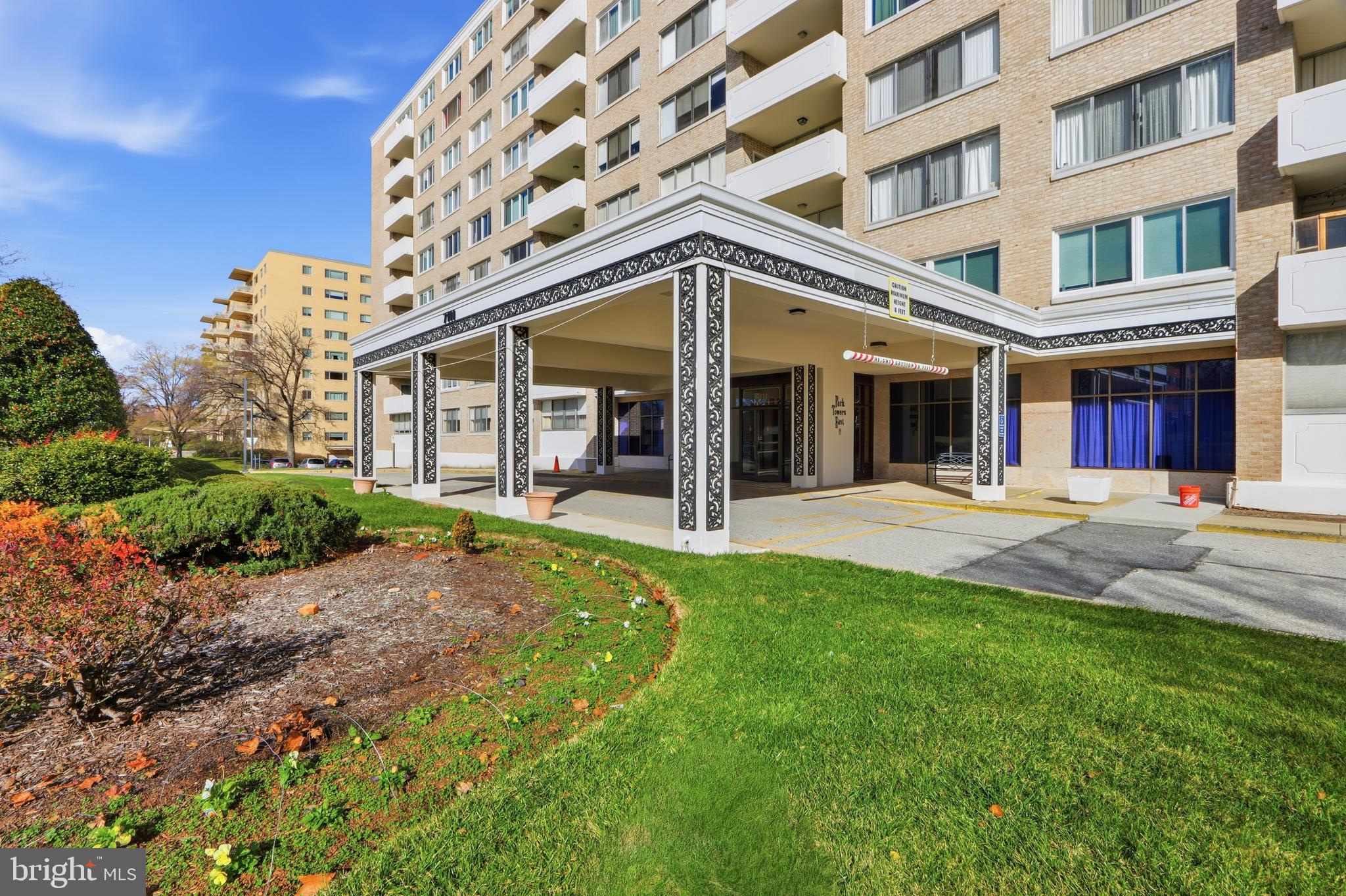 7111 Park Heights Avenue, Unit 104 Baltimore, MD 21215 - Photo 4 of 39 a view of a building with a swimming pool