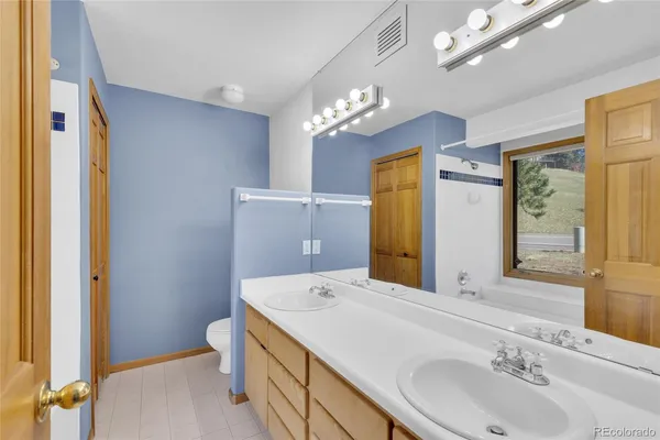 $395,000 | 23617 Genesee Village Road, Unit A, Golden, CO 80401