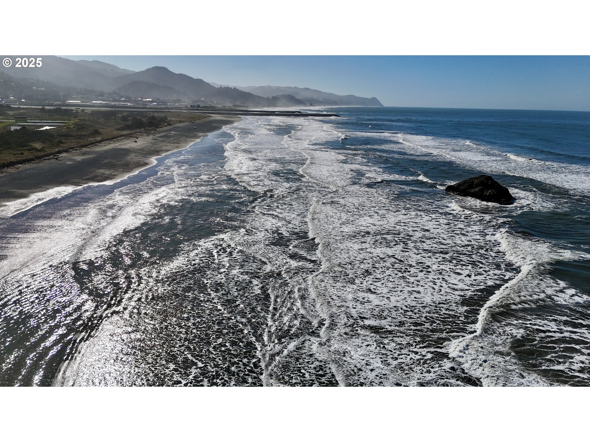 Old Coast Road Gold Beach, OR 97444 - Photo 11 of 26 a black and white photo of a field