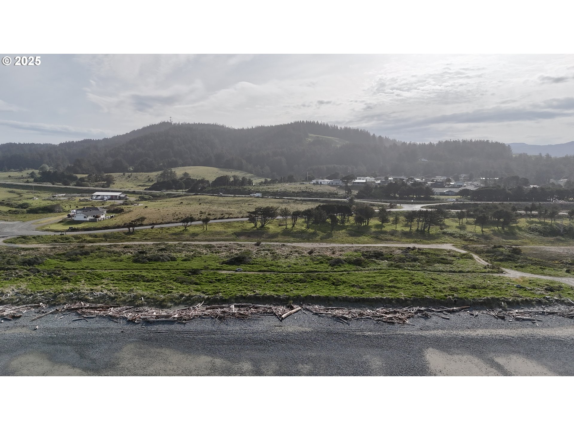 Old Coast Road Gold Beach, OR 97444 - Photo 21 of 26 a picture of a houses with a street