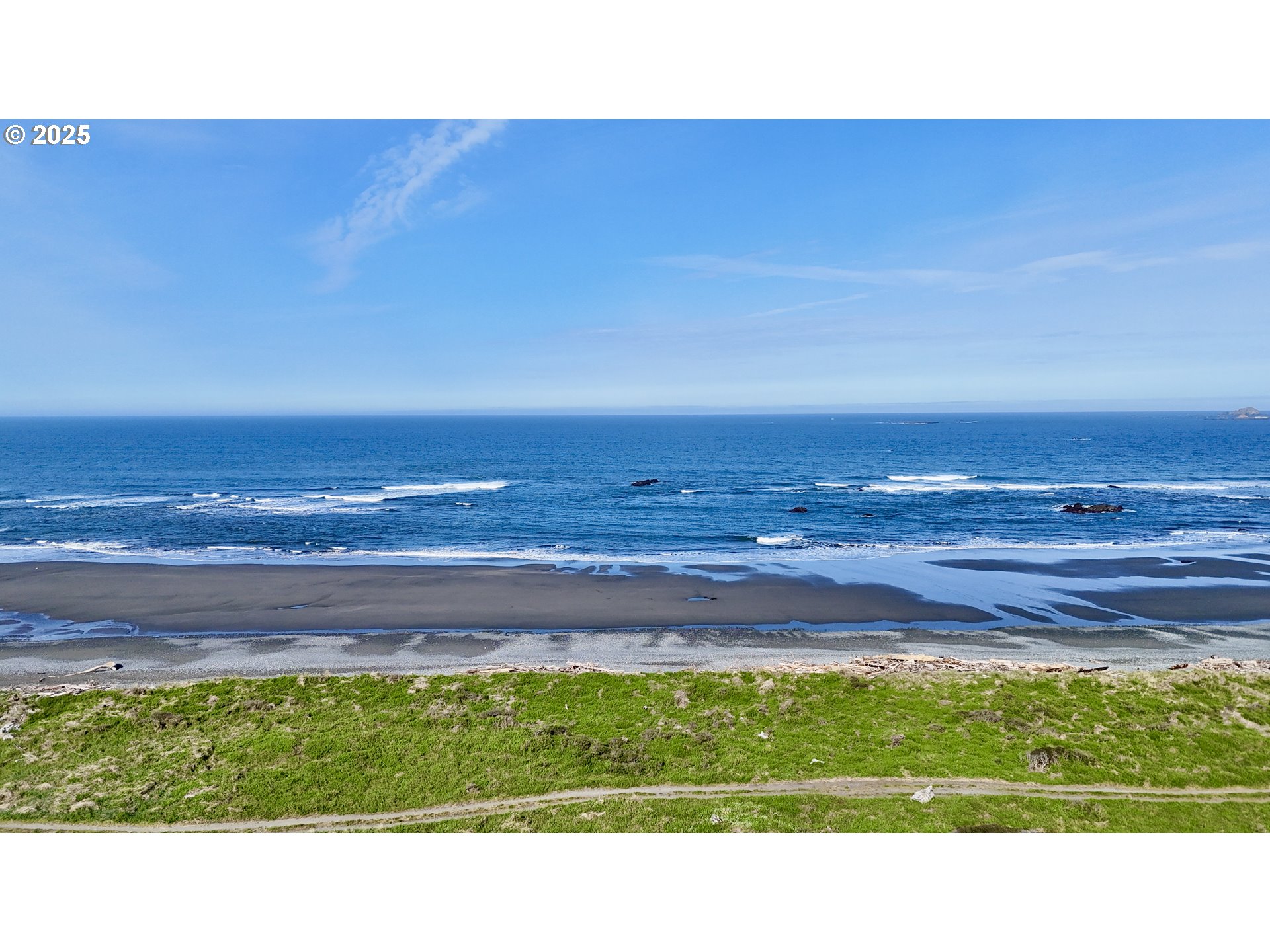 Old Coast Road Gold Beach, OR 97444 - Photo 6 of 26 a black and white photo of a field
