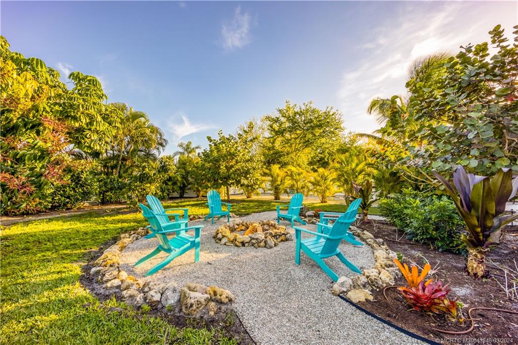 3713 Southeast Matanzas Street Stuart, FL 34996 - Photo 13 of 53 a view of a swimming pool with a patio