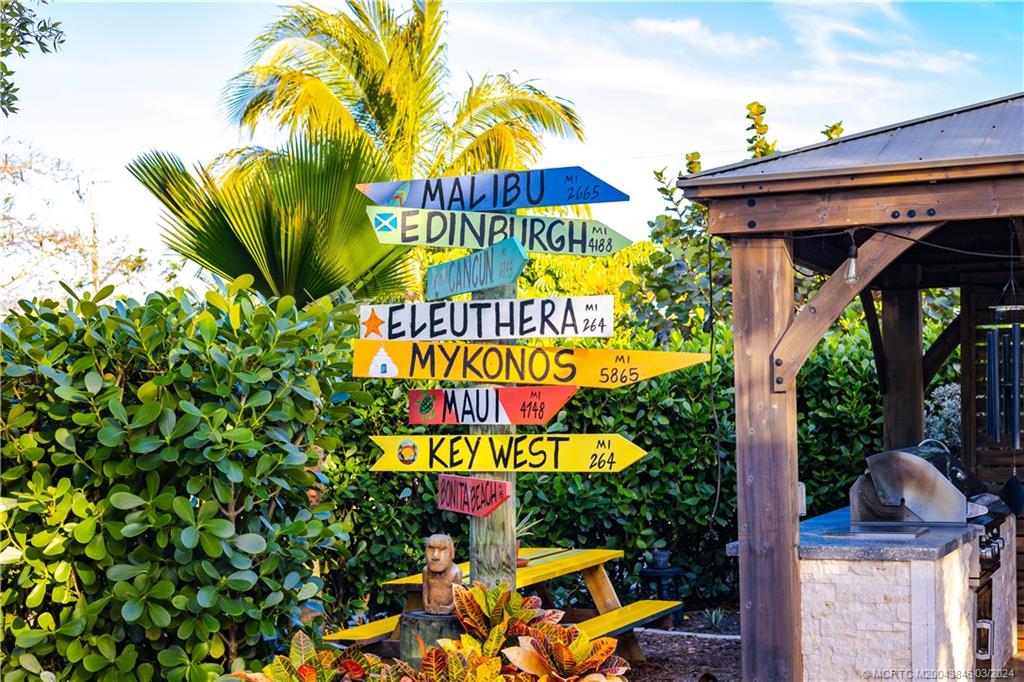 3713 Southeast Matanzas Street Stuart, FL 34996 - Photo 14 of 53 a sign that is on a pole